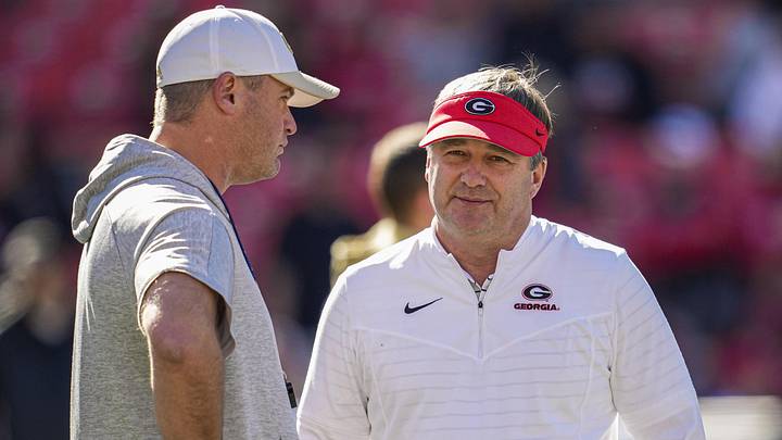 Nov 26, 2022; Athens, Georgia, USA; Georgia Bulldogs head coach Kirby Smart (right) talks to Georgia Tech Yellow Jackets interim head coach Brent Key prior to the game at Sanford Stadium. Nov 26, 2022; Athens, Georgia, USA; Georgia Bulldogs head coach Kirby Smart (right) talks to Georgia Tech Yellow Jackets interim head coach Brent Key prior to the game at Sanford Stadium.