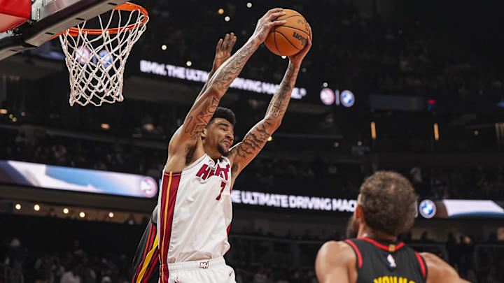 Miami Heat center Kel'el Ware (7) controls a rebound against the Atlanta Hawks during the first half at State Farm Arena.
