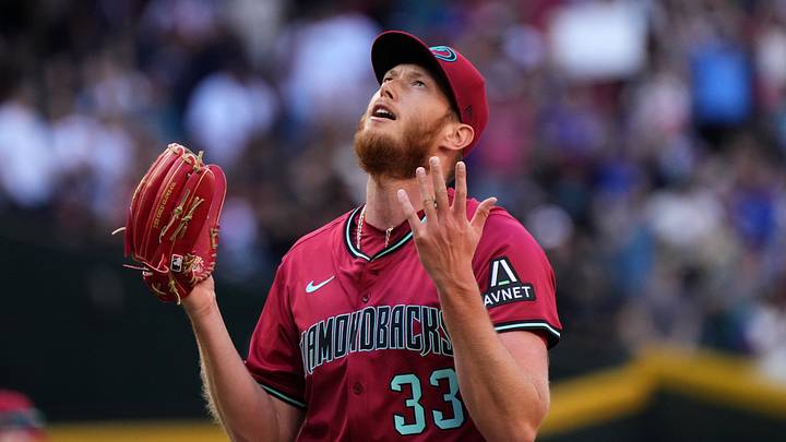 Arizona Diamondbacks left-hander A.J. Puk (33) reacts after closing out their 10-6 win against the Chicago Cubs at Chase Field in Phoenix on Sunday, March 30, 2025. Arizona Diamondbacks left-hander A.J. Puk (33) reacts after closing out their 10-6 win against the Chicago Cubs at Chase Field in Phoenix on Sunday, March 30, 2025.