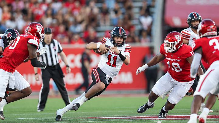 Utah quarterback Isaac Wilson runs the ball in a game against Houston. Utah quarterback Isaac Wilson runs the ball in a game against Houston.
