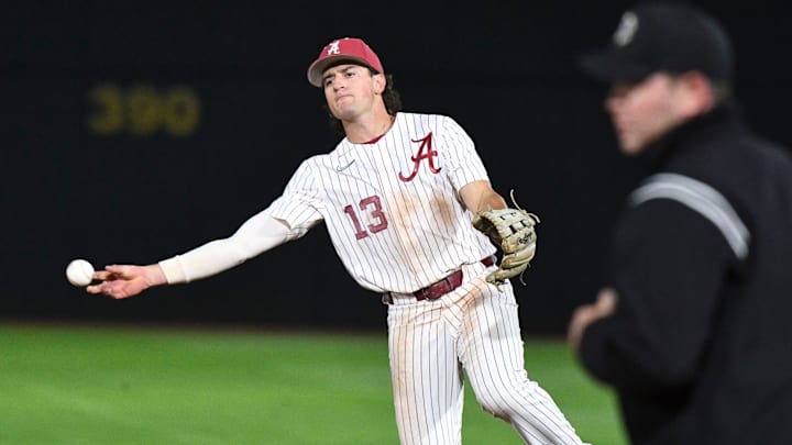 Mar 16, 2024; Tuscaloosa, Alabama, USA; Alabama second baseman Bryce Eblin throws to first to record