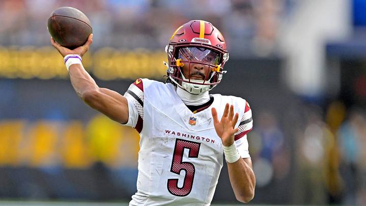 Oct 5, 2025; Inglewood, California, USA; Washington Commanders quarterback Jayden Daniels (5) looks to pass against the Los Angeles Chargers at SoFi Stadium. Mandatory Credit: Jayne Kamin-Oncea-Imagn Images