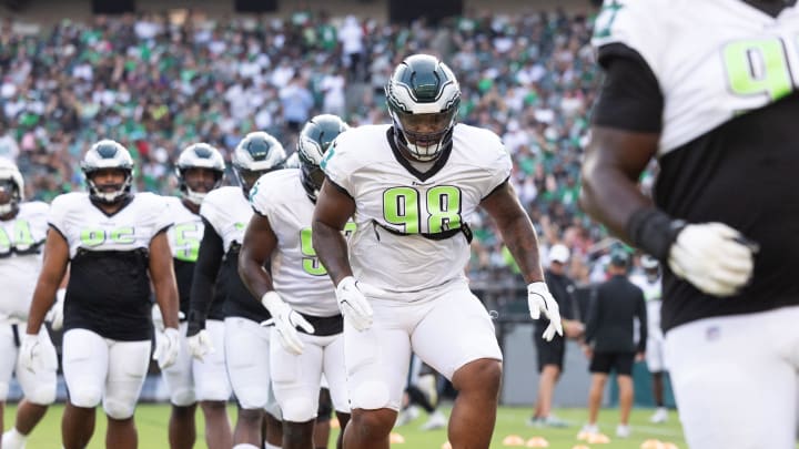 Philadelphia Eagles defensive tackle Jalen Carter (98) runs drills during a training camp practice at Lincoln Financial Field. 