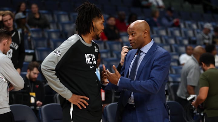 Oct 30, 2024; Memphis, Tennessee, USA; Former NBA player Vince Carter talks with Brooklyn Nets forward Ziaire Williams (1) during warm ups prior to the game against the Memphis Grizzlies at FedExForum. Mandatory Credit: Petre Thomas-Imagn Images