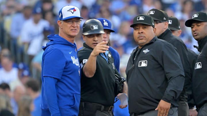 Don Mattingly spoke with the umpires before Game 3. 