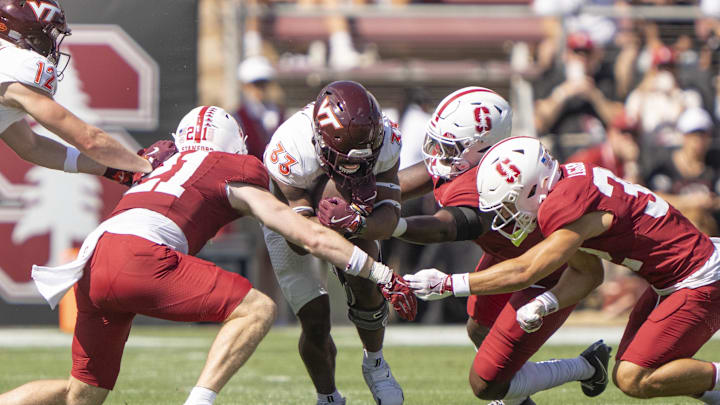 Oct 5, 2024; Stanford, California, USA;  Virginia Tech Hokies running back Bhayshul Tuten (33) runs with the ball against the Stanford Cardinal during the second quarter at Stanford Stadium. Mandatory Credit: Stan Szeto-Imagn Images