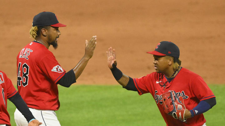 Jul 11, 2022; Cleveland, Ohio, USA; Cleveland Guardians relief pitcher Emmanuel Clase (48) and third baseman Jose Ramirez (11) celebrate a win over the Chicago White Sox at Progressive Field. Mandatory Credit: David Richard-Imagn Images