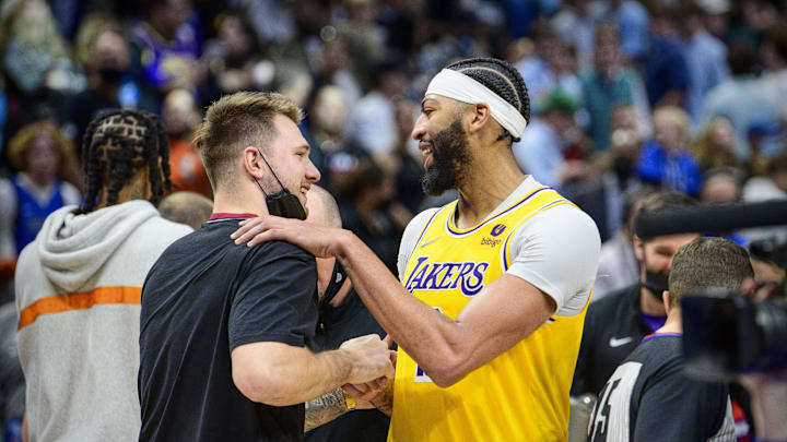 Luka Doncic and Anthony Davis after the Mavericks' 107–104 overtime loss to the Lakers on Dec. 15, 2021.