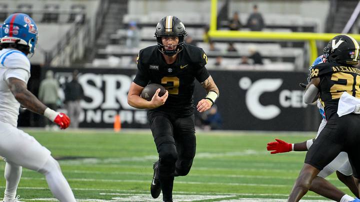 Oct 10, 2026; Nashville, Tennessee, USA;  Vanderbilt Commodores quarterback Jared Curtis (2) runs with the ball against the Mississippi Rebels during the second half at FirstBank Stadium.  Mandatory Credit: Steve Roberts-Imagn Images