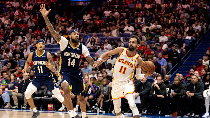 Nov 3, 2024; New Orleans, Louisiana, USA; Atlanta Hawks guard Trae Young (11) passes against New Orleans Pelicans forward Brandon Ingram (14) during the first half at Smoothie King Center. Mandatory Credit: Stephen Lew-Imagn Images Nov 3, 2024; New Orleans, Louisiana, USA; Atlanta Hawks guard Trae Young (11) passes against New Orleans Pelicans forward Brandon Ingram (14) during the first half at Smoothie King Center. Mandatory Credit: Stephen Lew-Imagn Images