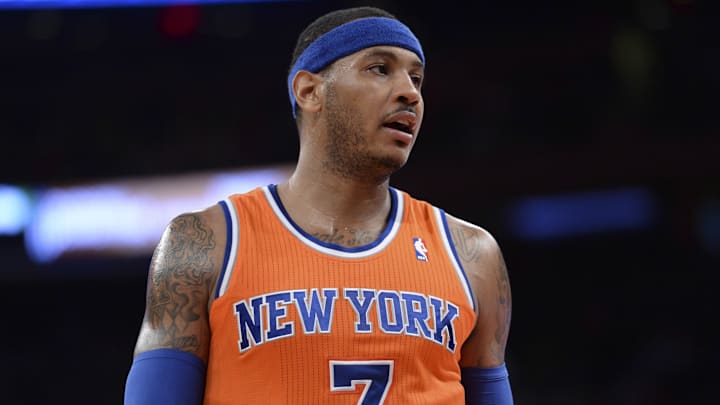 Dec 8, 2013; New York, NY, USA; New York Knicks small forward Carmelo Anthony (7) looks on against the Boston Celtics during the second half at Madison Square Garden. The Celtics won the game 114-73. Mandatory Credit: Joe Camporeale-Imagn Images