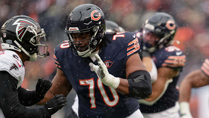 Dec 31, 2023; Chicago, Illinois, USA;  Chicago Bears offensive lineman Braxton Jones (70) blocks against the Atlanta Falcons at Soldier Field. Mandatory Credit: Jamie Sabau-Imagn Images