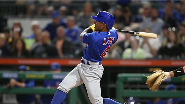 Sep 26, 2019; Pittsburgh, PA, USA;  Chicago Cubs left fielder Tony Kemp (4) hits an RBI double against the Pittsburgh Pirates during the seventh inning at PNC Park.  Pittsburgh won 9-5. 