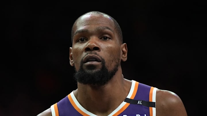 Mar 26, 2025; Phoenix, Arizona, USA; Phoenix Suns forward Kevin Durant (35) looks on against the Boston Celtics during the second half at Footprint Center. Mandatory Credit: Rick Scuteri-Imagn Images