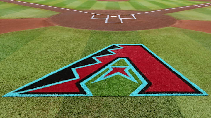 Apr 16, 2024; Phoenix, Arizona, USA; General view of the Arizona Diamondbacks logo on the field prior to the game against the Chicago Cubs at Chase Field. Mandatory Credit: Matt Kartozian-Imagn Images