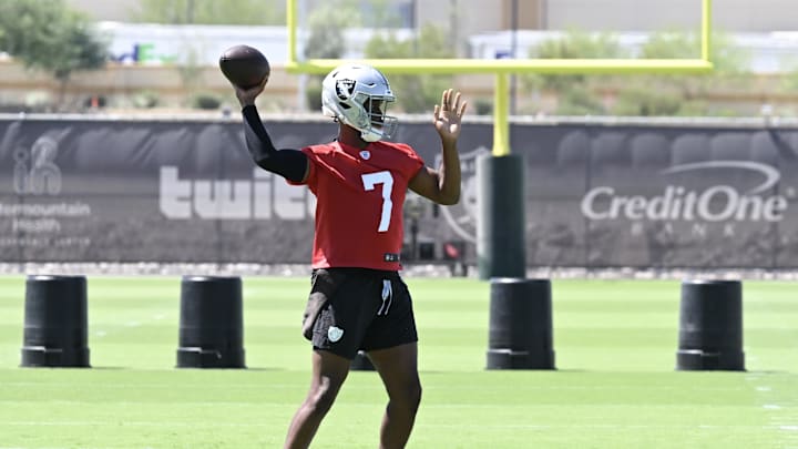 Jun 11, 2025; Henderson, NV, USA; Las Vegas Raiders quarterback Geno Smith (7) runs through a drill during Las Vegas Raiders Minicamp at Intermountain Health Performance Center. Mandatory Credit: Candice Ward-Imagn Images Jun 11, 2025; Henderson, NV, USA; Las Vegas Raiders quarterback Geno Smith (7) runs through a drill during Las Vegas Raiders Minicamp at Intermountain Health Performance Center. Mandatory Credit: Candice Ward-Imagn Images