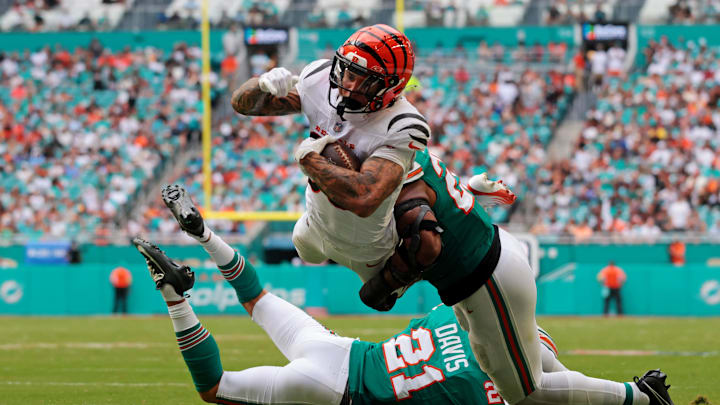 Cincinnati Bengals running back Chase Brown (30) scores a touchdown during the third quarter against the Cincinnati Bengals at Hard Rock Stadium.