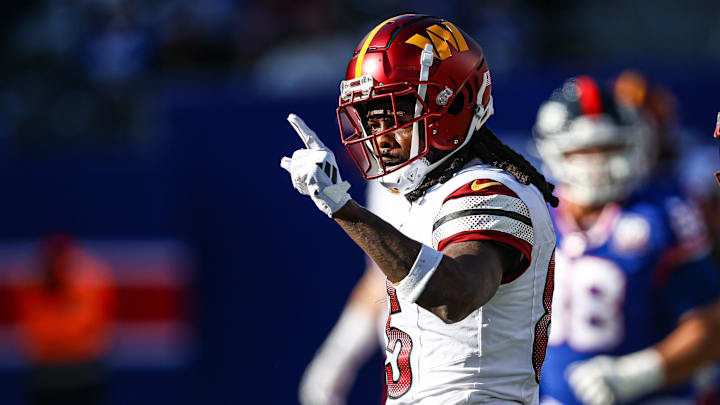 Nov 3, 2024; East Rutherford, New Jersey, USA; Washington Commanders wide receiver Noah Brown (85) reacts after a first down reception during the first half against the New York Giants at MetLife Stadium. Mandatory Credit: Vincent Carchietta-Imagn Images