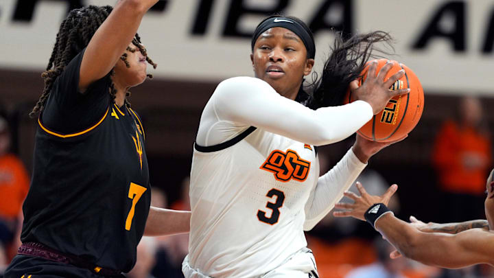 Oklahoma State Cowgirls guard Micah Gray (3) goes past Arizona State Sun Devils guard Jazion Jackson (7) during a women's college basketball game between the Oklahoma State Cowgirls (OSU) and the Arizona State Sun Devils at Gallagher-Iba Arena in Stillwater, Okla., Wednesday, Jan. 29, 2025.