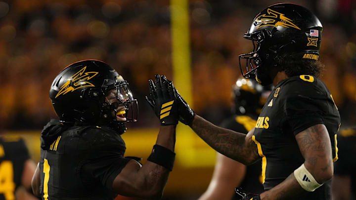 Sep 26, 2025; Tempe, Arizona, USA; Arizona State Sun Devils wide receiver Jordyn Tyson (0) celebrates touchdown with running back Kyson Brown (1) against the TCU Horned Frogs in the second half at Mountain America Stadium, Home of the ASU Sun Devils. Mandatory Credit: Jacob Reiner-Imagn Images Sep 26, 2025; Tempe, Arizona, USA; Arizona State Sun Devils wide receiver Jordyn Tyson (0) celebrates touchdown with running back Kyson Brown (1) against the TCU Horned Frogs in the second half at Mountain America Stadium, Home of the ASU Sun Devils. Mandatory Credit: Jacob Reiner-Imagn Images