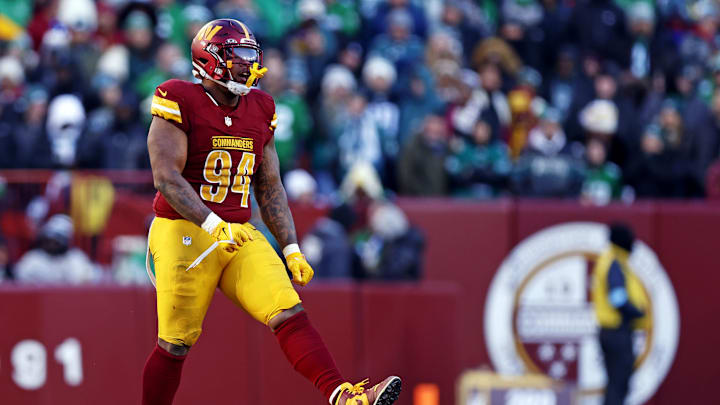 Dec 22, 2024; Landover, Maryland, USA; Washington Commanders defensive tackle Daron Payne (94) celebrates after a play during the third quarter against the Philadelphia Eagles at Northwest Stadium. Mandatory Credit: Peter Casey-Imagn Images