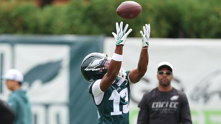 Jul 30, 2026; Philadelphia, PA, USA; Philadelphia Eagles wide receiver Dontayvion Wicks (13) reaches for a pass during training camp at Jefferson Health Training Complex. Mandatory Credit: Bill Streicher-Imagn Images