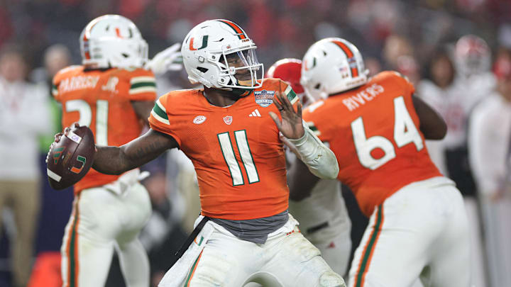 Dec 28, 2023; Bronx, NY, USA; Miami Hurricanes quarterback Jacurri Brown (11) throws the ball during