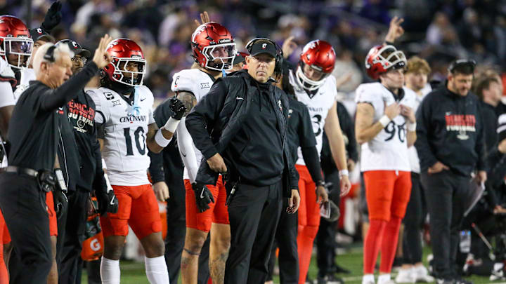 Nov 23, 2024; Manhattan, Kansas, USA; Cincinnati Bearcats head coach Scott Satterfield looks on during the fourth quarter against the Kansas State Wildcats at Bill Snyder Family Football Stadium. Mandatory Credit: Scott Sewell-Imagn Images