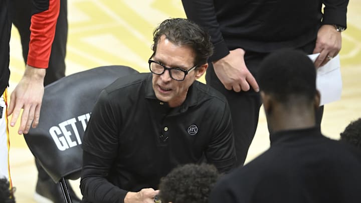 Jan 30, 2025; Cleveland, Ohio, USA; Atlanta Hawks head coach Quin Snyder talks to his team during a timeout in the fourth quarter against the Cleveland Cavaliers at Rocket Mortgage FieldHouse. Mandatory Credit: David Richard-Imagn Images