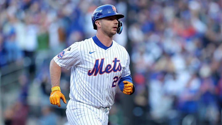 Oct 18, 2024; New York City, New York, USA; New York Mets first baseman Pete Alonso (20) rounds the bases after hitting a three run home run against the Los Angeles Dodgers during the first inning of game five of the NLCS during the 2024 MLB playoffs at Citi Field.