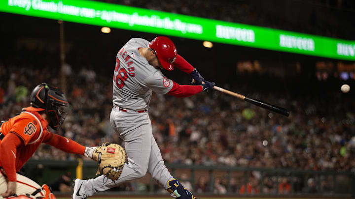 Sep 27, 2024; San Francisco, California, USA; St. Louis Cardinals third baseman Nolan Arenado (28) hits a double against the San Francisco Giants during the fourth inning at Oracle Park. Mandatory Credit: D. Ross Cameron-Imagn Images