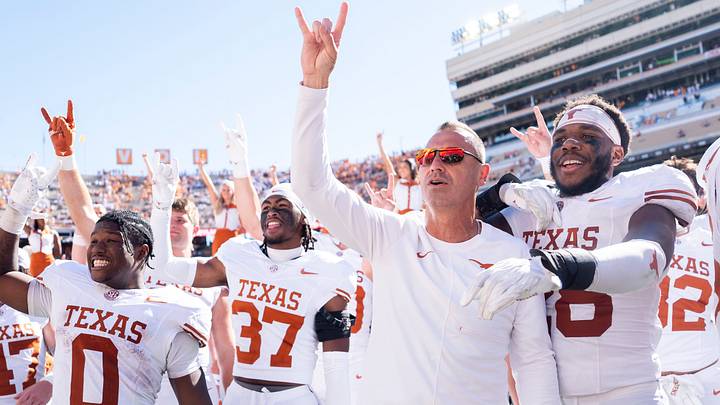 Texas coach Steve Sarkisian sings “The Eyes of Texas” with his team. Texas coach Steve Sarkisian sings “The Eyes of Texas” with his team.