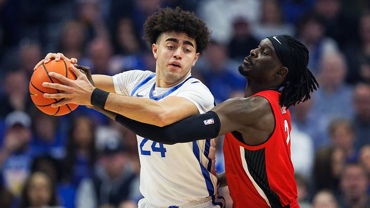 Feb 17, 2026; Lexington, Kentucky, USA; Georgia Bulldogs center Somto Cyril (2) attempts to steal the ball from Kentucky Wildcats center Malachi Moreno (24) during the first half at Rupp Arena at Central Bank Center. Mandatory Credit: Jordan Prather-Imagn Images Feb 17, 2026; Lexington, Kentucky, USA; Georgia Bulldogs center Somto Cyril (2) attempts to steal the ball from Kentucky Wildcats center Malachi Moreno (24) during the first half at Rupp Arena at Central Bank Center. Mandatory Credit: Jordan Prather-Imagn Images