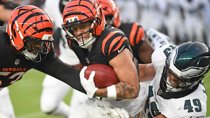 Aug 7, 2025; Philadelphia, Pennsylvania, USA; Cincinnati Bengals wide receiver Jermaine Burton (81) is tackled by Philadelphia Eagles tight end Cameron Latu (49) during the first quarter at Lincoln Financial Field. Mandatory Credit: Eric Hartline-Imagn Images Aug 7, 2025; Philadelphia, Pennsylvania, USA; Cincinnati Bengals wide receiver Jermaine Burton (81) is tackled by Philadelphia Eagles tight end Cameron Latu (49) during the first quarter at Lincoln Financial Field. Mandatory Credit: Eric Hartline-Imagn Images