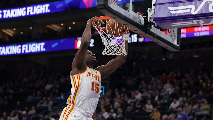 Jan 7, 2025; Salt Lake City, Utah, USA;  Atlanta Hawks center Clint Capela (15) dunks the ball during the first quarter against the Utah Jazz at Delta Center. Mandatory Credit: Chris Nicoll-Imagn Images