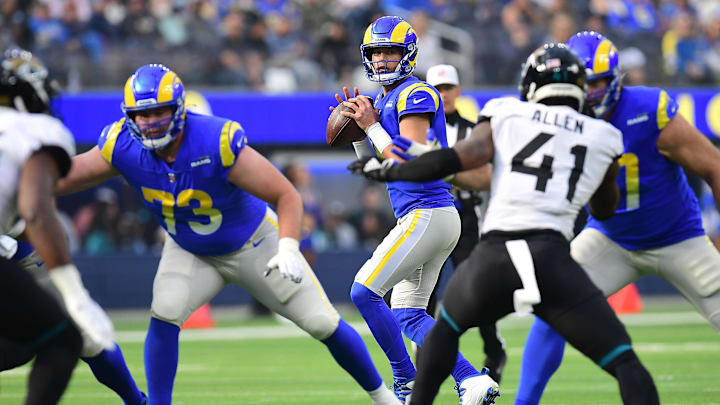 Dec 5, 2021; Inglewood, California, USA; Los Angeles Rams quarterback Matthew Stafford (9) drops back to pass against the Jacksonville Jaguars during the first half at SoFi Stadium. Mandatory Credit: Gary A. Vasquez-Imagn Images