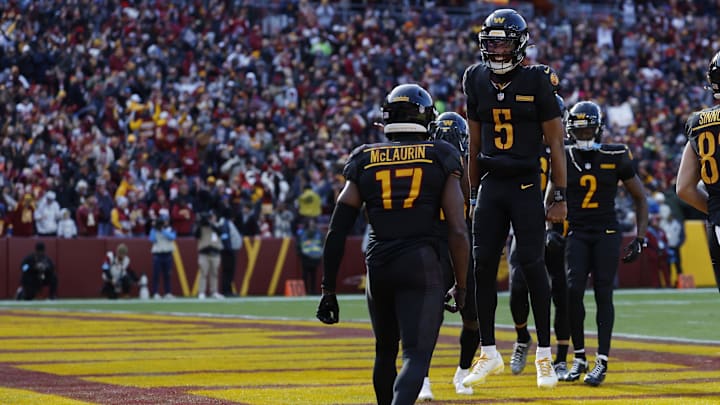 Washington Commanders wide receiver Terry McLaurin and Commanders quarterback Jayden Daniels.
