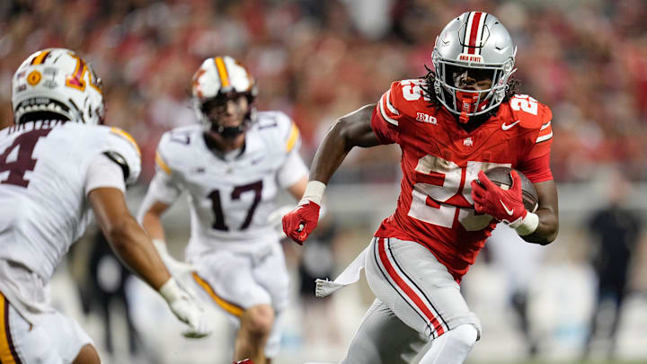 Ohio State Buckeyes running back Bo Jackson (25) runs past Minnesota Golden Gophers defensive back Za'Quan Bryan (4) during the second half of the NCAA football game at Ohio Stadium in Columbus on Oct. 4, 2025. Ohio State won 42-3.