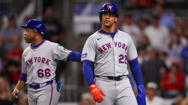 Jun 17, 2025; Atlanta, Georgia, USA; New York Mets right fielder Juan Soto (22) reacts with first base coach Antoan Richardson (66) after being doubled off first base against the Atlanta Braves in the ninth inning at Truist Park. Mandatory Credit: Brett Davis-Imagn Images