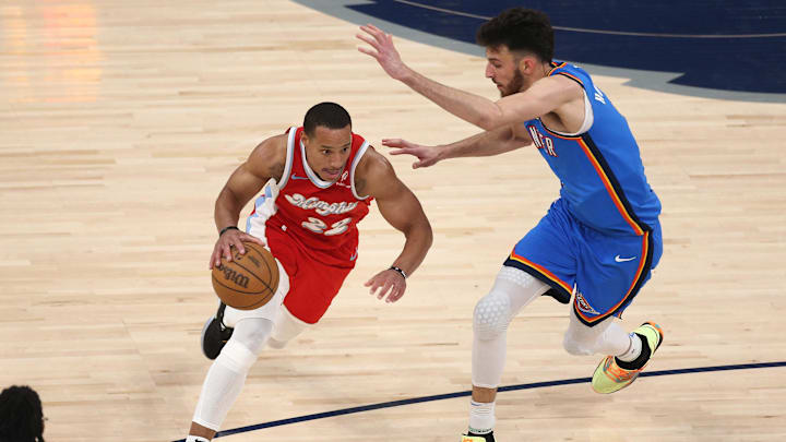 Apr 26, 2025; Memphis, Tennessee, USA; Memphis Grizzlies guard Desmond Bane (22) drives to the basket as Oklahoma City Thunder forward Chet Holmgren (7) defends during the second quarter during game four for the first round of the 2024 NBA Playoffs at FedExForum. Mandatory Credit: Petre Thomas-Imagn Images
