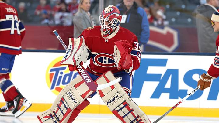 Montreal Canadiens goaltender Jacob Fowler (32) warms up before a game against the Winnipeg Jets during the 2026 Heritage Classic ice hockey game at Princess Auto Stadium.  Mandatory Credit: James Carey Lauder-Imagn Images