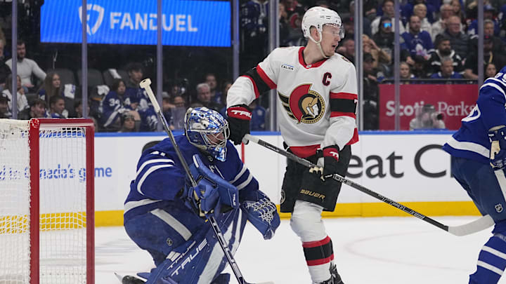 Apr 20, 2025; Toronto, Ontario, CAN; Toronto Maple Leafs goaltender Anthony Stolarz (41) looks for the puck around Ottawa Senators forward Brady Tkachuk (7) during the second period of game one of the first round of the 2025 Stanley Cup Playoffs at Scotiabank Arena. Mandatory Credit: John E. Sokolowski-Imagn Images