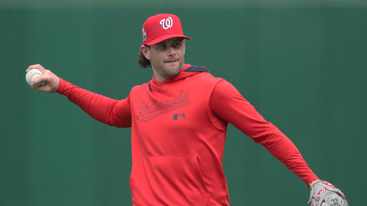 Apr 15, 2025; Pittsburgh, Pennsylvania, USA; Washington Nationals relief pitcher Kyle Finnegan (67) throws in the outfield before the game against the Pittsburgh Pirates at PNC Park. Apr 15, 2025; Pittsburgh, Pennsylvania, USA; Washington Nationals relief pitcher Kyle Finnegan (67) throws in the outfield before the game against the Pittsburgh Pirates at PNC Park.