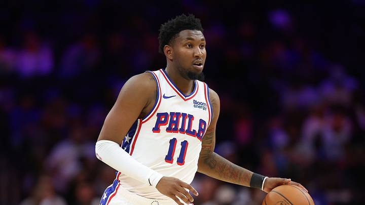 Philadelphia 76ers forward Justin Edwards (11) controls the ball against the New York Knicks during the fourth quarter at Xfinity Mobile Arena on Oct. 5, 2026.