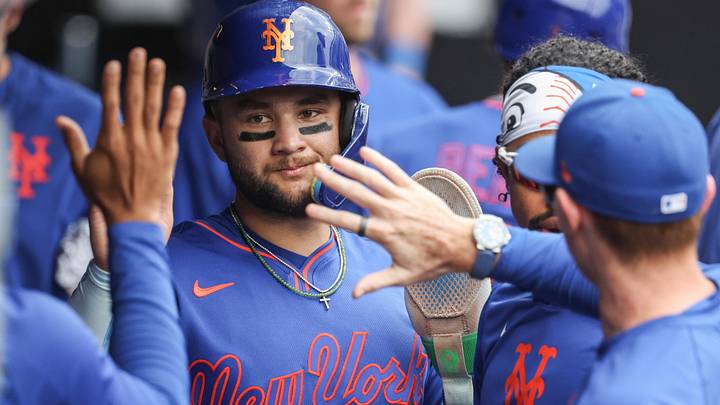 Jun 14, 2026; New York City, New York, USA;  New York Mets shortstop Bo Bichette (19) is greeted in the dugout after scoring in the eighth inning against the Atlanta Braves at Citi Field. Mandatory Credit: Wendell Cruz-Imagn Images