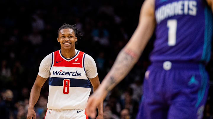 Mar 1, 2025; Charlotte, North Carolina, USA; Washington Wizards guard Bub Carrington (8) celebrates after scoring against the Charlotte Hornets during the third quarter at Spectrum Center. Mandatory Credit: Scott Kinser-Imagn Images
