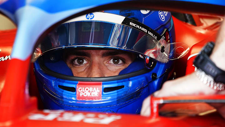 May 4, 2024; Miami Gardens, Florida, USA; Ferrari driver Carlos Sainz (55) gets strapped into his car in the paddock area before the F1 Sprint Race at Miami International Autodrome. Mandatory Credit: John David Mercer-USA TODAY Sports May 4, 2024; Miami Gardens, Florida, USA; Ferrari driver Carlos Sainz (55) gets strapped into his car in the paddock area before the F1 Sprint Race at Miami International Autodrome. Mandatory Credit: John David Mercer-USA TODAY Sports