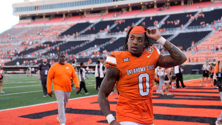 Oklahoma State Cowboys running back Ollie Gordon II (0) walks of the field after a college football game between the Oklahoma State Cowboys (OSU) and the West Virginia Mountaineers at Boone Pickens Stadium in Stillwater, Okla., Saturday, Oct. 5, 2024. Oklahoma State Cowboys running back Ollie Gordon II (0) walks of the field after a college football game between the Oklahoma State Cowboys (OSU) and the West Virginia Mountaineers at Boone Pickens Stadium in Stillwater, Okla., Saturday, Oct. 5, 2024.