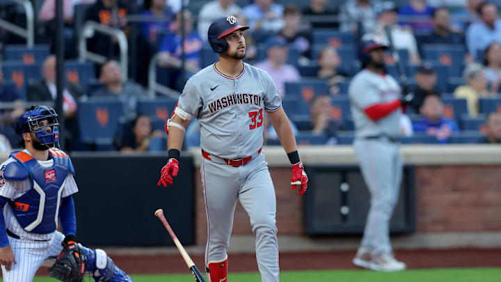 Jun 10, 2025; New York City, New York, USA; Washington Nationals first baseman Nathaniel Lowe (33) watches his two run home run against the New York Mets during the first inning at Citi Field. 