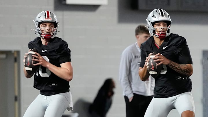 Ohio State Buckeyes quarterback Julian Sayin (10) and quarterback Tavien St. Clair (9) drop back to pass during spring football practice at the Woody Hayes Athletic Center in Columbus on March 19, 2025.